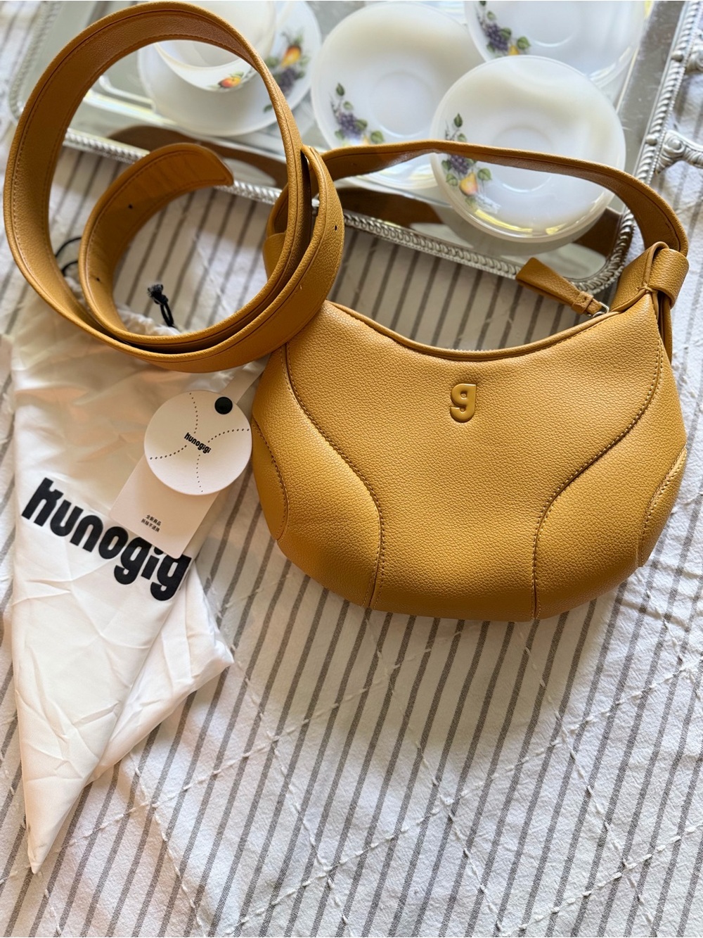 NWT KUNOGIGI mustard yellow Women's
Baseball Shoulder Bag